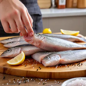 Рецепт Сельдь с черничным кулисом и миндальными хлопьями - Подготовка сельди