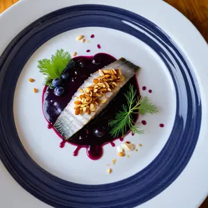 Рецепт Сельдь с черничным кулисом и миндальными хлопьями - Сборка блюда