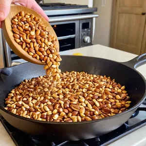 Рецепт Сельдь с тыквенным муссом и кедровыми орешками - Обжарка кедровых орешков