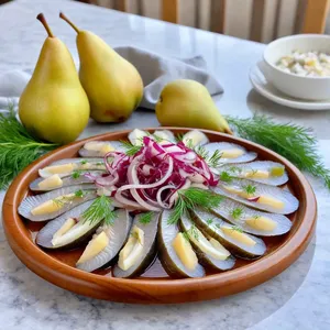 Рецепт Солёная сельдь с грушей и голубым сыром - Сборка блюда