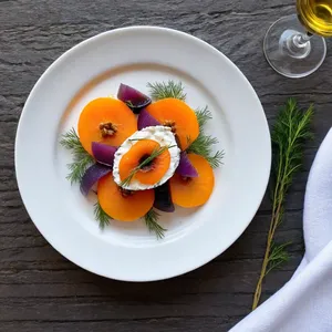 Рецепт Солёная сельдь с хурмой и козьим сыром - Сборка закуски