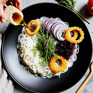 Рецепт Солёная сельдь с редькой и мёдом - Сборка салата
