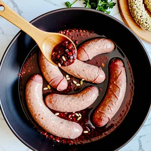 Рецепт Сосиски с соусом из граната и кедровыми орешками - Соединение компонентов