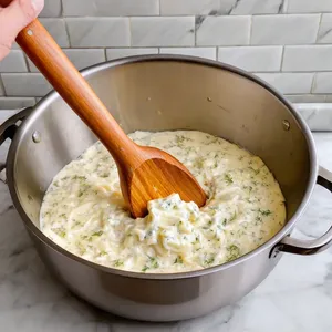 Рецепт Сырные рулетики с ветчиной и орехами - Приготовление сырной массы