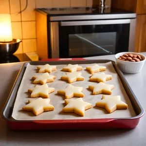 Рецепт Сырные звёздочки с апельсином и миндалём - Выпекание