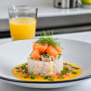 Рецепт Тартар из сибаса с цитрусовым соусом и рукколой - Сборка тартара