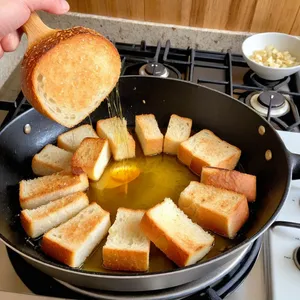 Рецепт Цезарь с гранатом и жареной курицей - Приготовление гренок