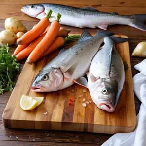 Рецепт Уха из морского окуня с мандарином и шалфеем - Подготовка рыбы и овощей