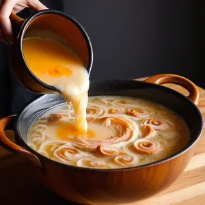 Рецепт Уха из щуки с можжевельником и сливками - Введение сливок