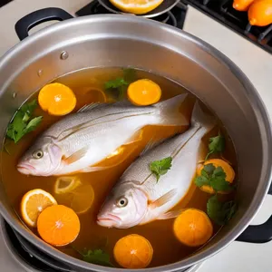 Рецепт Варёный сибас с мандарином и розмарином - Варка сибаса