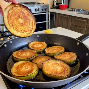 Рецепт Жареные баклажаны с чесночным соусом - Обжаривание баклажанов