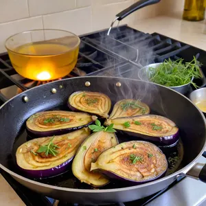 Рецепт Жареные баклажаны с фисташковой крошкой и мятой - Обжарка баклажанов