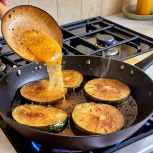 Рецепт Жареные баклажаны с манговым чатни и кешью - Обжарка баклажанов
