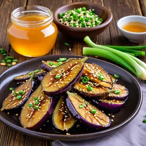 Рецепт Жареные баклажаны с медом и кунжутом - Подача блюда