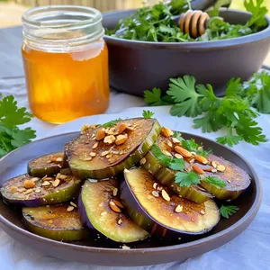 Рецепт Жареные баклажаны с медом и миндалем - Сборка блюда