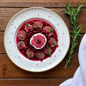 Карпаччо из кабана с брусничным соусом и розмарином