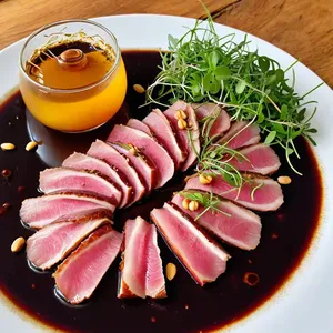 Карпаччо из утиной грудки с мёдом и кедровыми орешками
