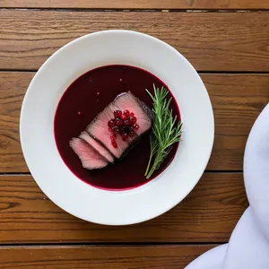 Копчёная оленина с брусничным соусом