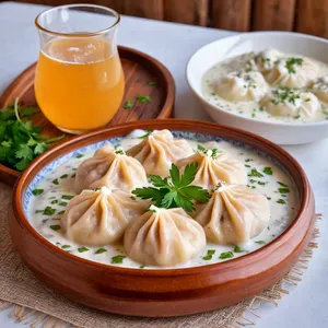 Манты с айраном и курицей