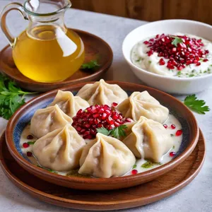 Манты с гранатом и ягненком