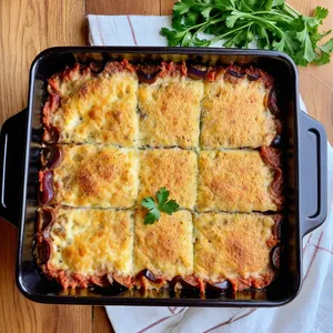 Мясная запеканка с баклажанами и эдамером