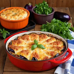 Мясная запеканка с баклажанами и гаудой