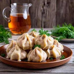 Пельмени с фаршем из фазана и черносливом в сливочно-коньячном соусе