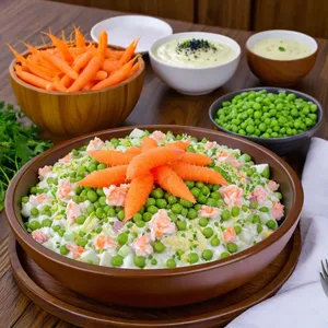 Салат "Оливье" с крабовыми палочками и икорным соусом