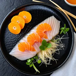 Сашими из сибаса с мандариновым соусом
