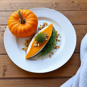 Сельдь с тыквенным муссом и кедровыми орешками
