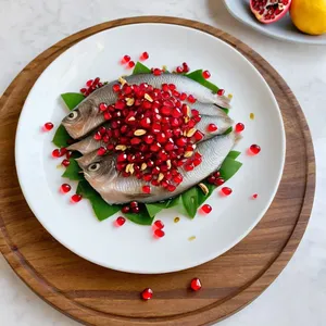 Солёная сельдь с гранатом и грецким орехом
