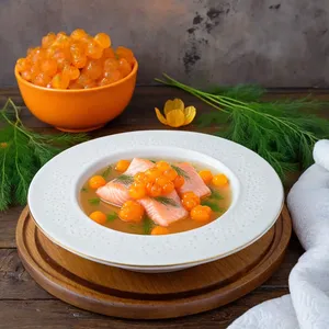 Уха из лосося с морошкой и укропом