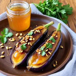 Жареные баклажаны с медом и кедровыми орешками